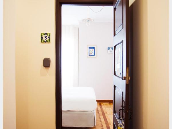 Senhor Gigi : photo 3 de la chambre chambre double ou lits jumeaux deluxe – vue sur jardin