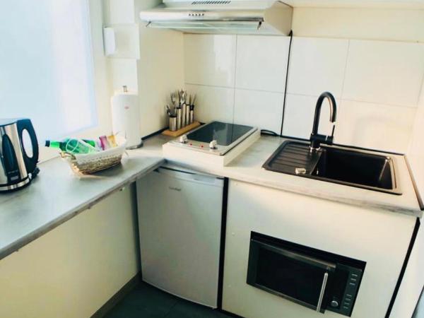 Schulz Apartments : photo 2 de la chambre appartement lits jumeaux avec cuisine