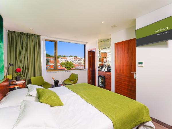 Horizon Luxury Suites : photo 4 de la chambre chambre double ou lits jumeaux deluxe - vue sur ville 