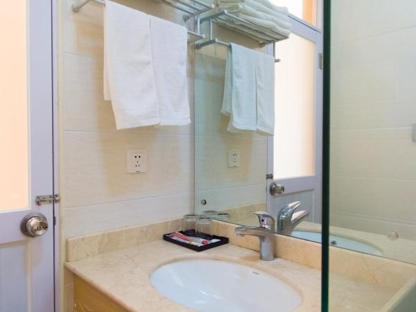 Sanya Passion fruit Inn : photo 1 de la chambre offre limitée - chambre double avec salle de bains privative