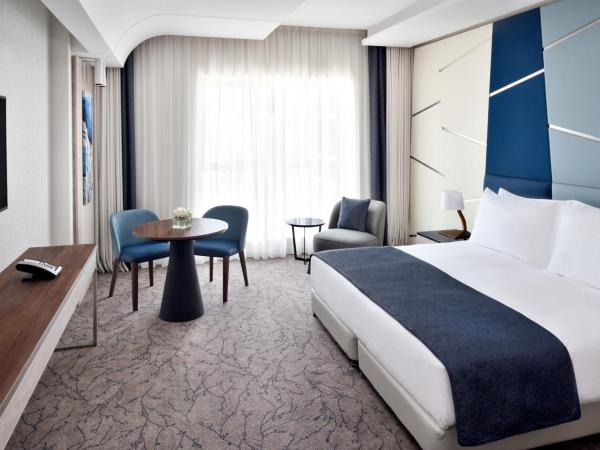 Mövenpick Hotel Apartments Downtown Dubai : photo 2 de la chambre chambre lit king-size deluxe
