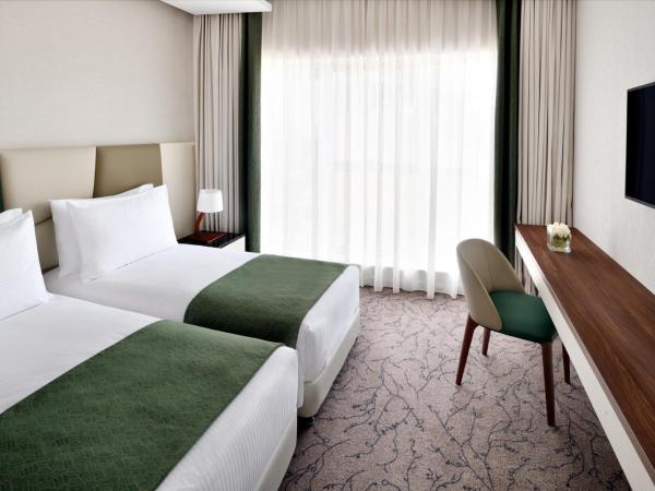 Mövenpick Hotel Apartments Downtown Dubai : photo 2 de la chambre appartement familial communicant 3 chambres
