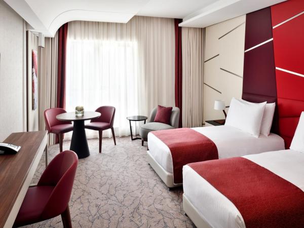 Mövenpick Hotel Apartments Downtown Dubai : photo 1 de la chambre chambre lits jumeaux deluxe