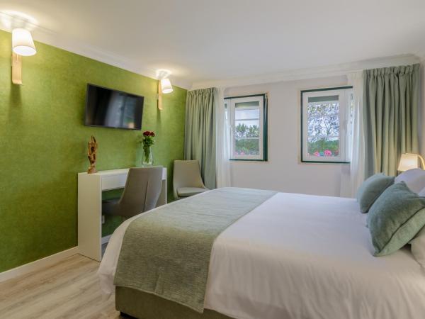 Ver Belém Suites : photo 3 de la chambre chambre double - vue sur jardin