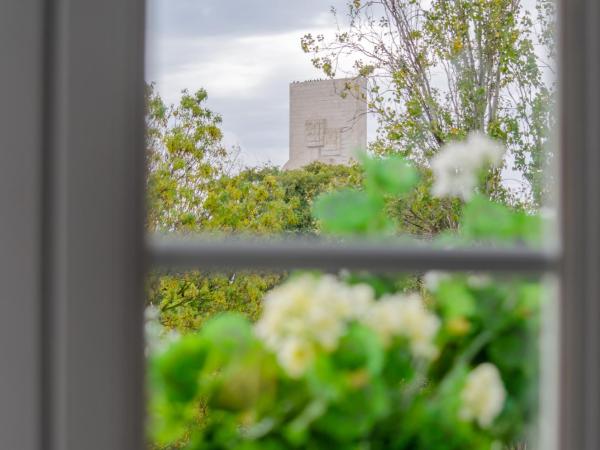 Ver Belém Suites : photo 3 de la chambre chambre lit queen-size - vue sur jardin