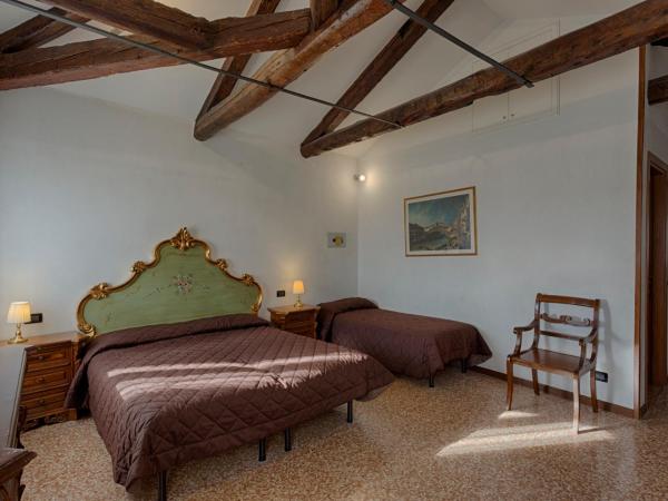 Hotel Guerrato : photo 8 de la chambre chambre quadruple