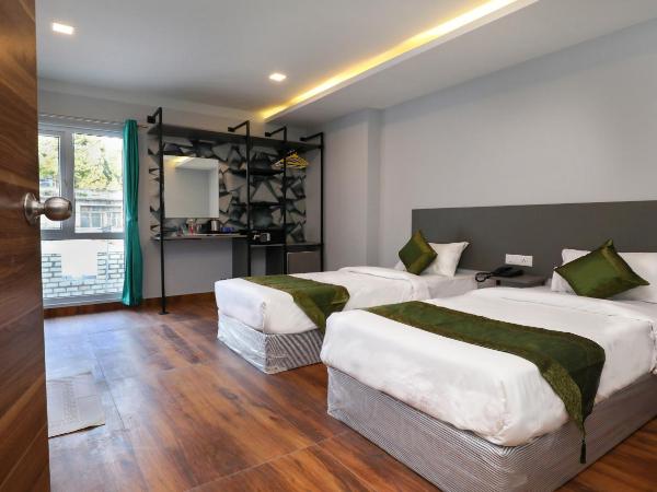 Treebo Apple Villa : photo 5 de la chambre [sanitized] deluxe double room