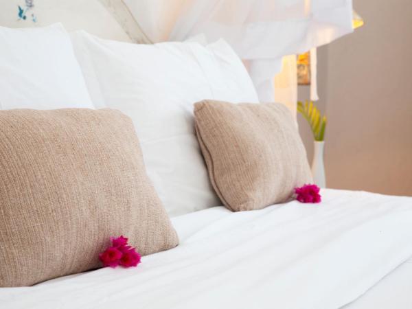 Pousada Casa Búzios : photo 4 de la chambre chambre double supérieure avec patio - vue sur jardin