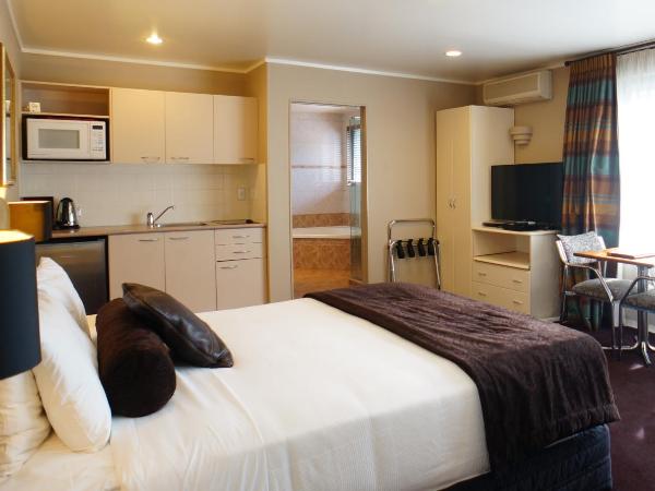 Cornwall Park Motor Inn : photo 7 de la chambre studio avec baignoire spa