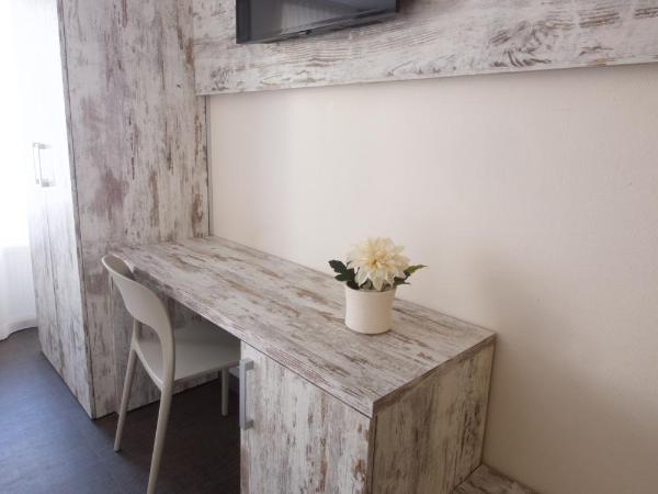 Il Piccolo Mondo : photo 1 de la chambre chambre triple standard