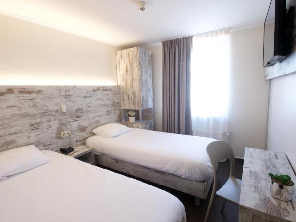 Il Piccolo Mondo : photo 2 de la chambre chambre lits jumeaux standard