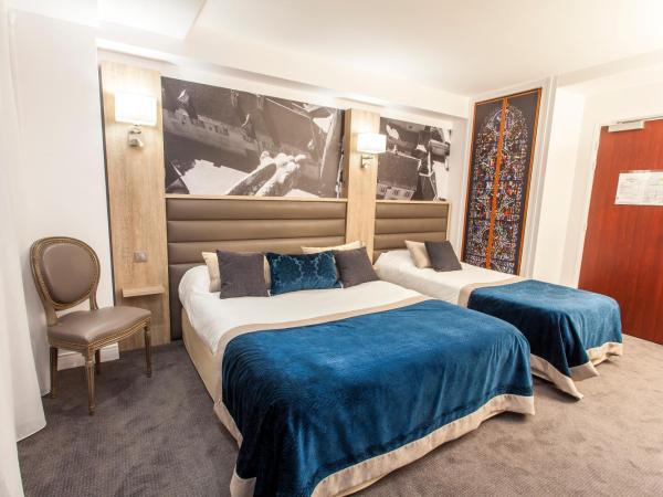 Logis - Le Christina : photo 7 de la chambre chambre triple confort