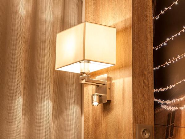Logis - Le Christina : photo 3 de la chambre chambre lits jumeaux confort