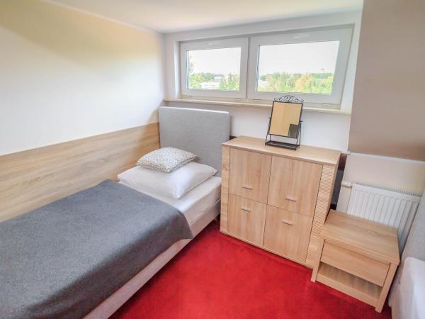 Botanik Hostel : photo 4 de la chambre chambre lits jumeaux avec salle de bains commune