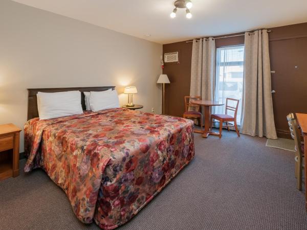 Hotel & Suites Monte-Cristo : photo 2 de la chambre chambre lit queen-size