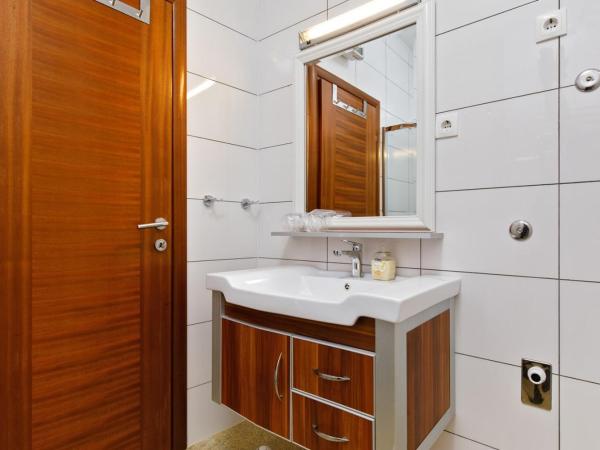 Ark Beach Apartments : photo 6 de la chambre appartement avec terrasse
