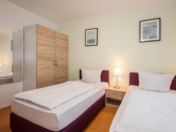 Hotel City Green Berlin : photo 2 de la chambre chambre triple basique