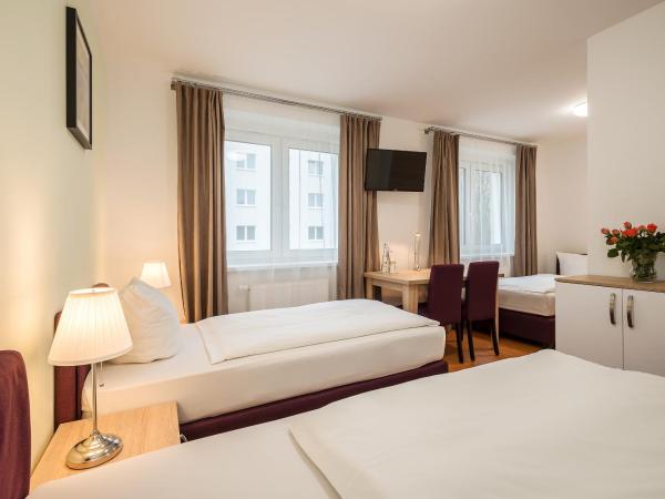 Hotel City Green Berlin : photo 1 de la chambre chambre triple basique