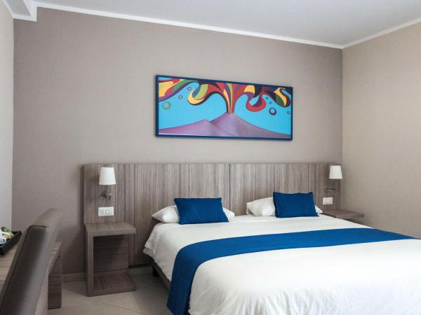 Art Suite nel Cuore di Napoli : photo 3 de la chambre chambre triple