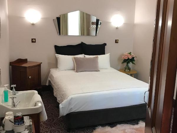 Astor Private Hotel : photo 4 de la chambre chambre double avec salle de bains commune