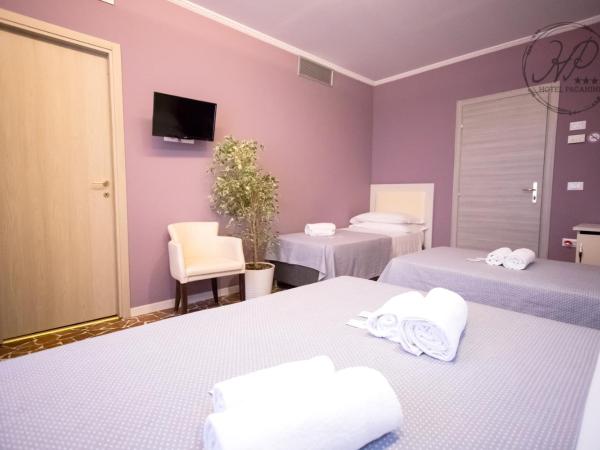 Hotel Paganini : photo 1 de la chambre chambre quadruple avec salle de bains privative