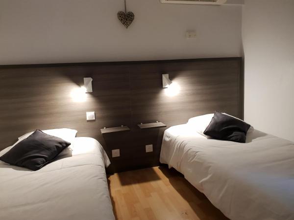 Hôtel Althea - Piscine et Sauna : photo 8 de la chambre chambre lits jumeaux