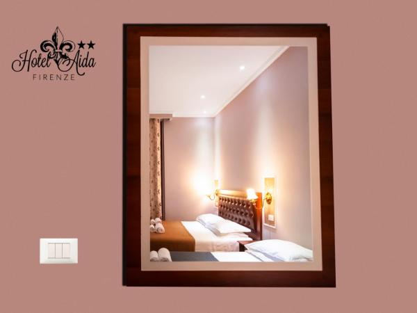 Hotel Aida : photo 2 de la chambre chambre triple avec salle de bains privative