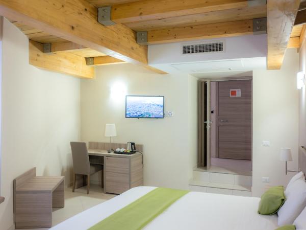 Art Suite nel Cuore di Napoli : photo 6 de la chambre chambre quadruple deluxe