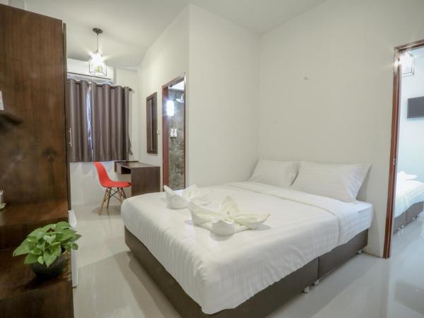 Hotel Wualai by CMStay : photo 2 de la chambre chambre deluxe avec 2 lits queen-size