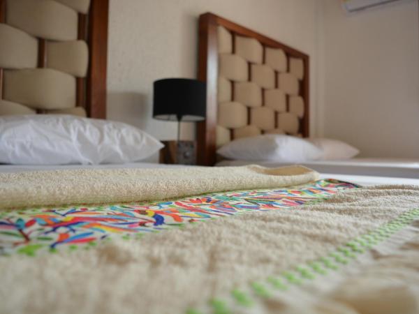 Kinta Kan Hotel Boutique Cozumel : photo 2 de la chambre chambre double avec 2 lits doubles