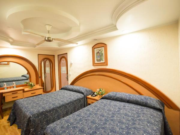 Hotel Diligencias : photo 5 de la chambre chambre quadruple