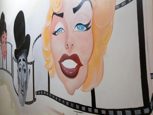 Hotel Cineholiday : photo 3 de la chambre chambre quadruple avec balcon