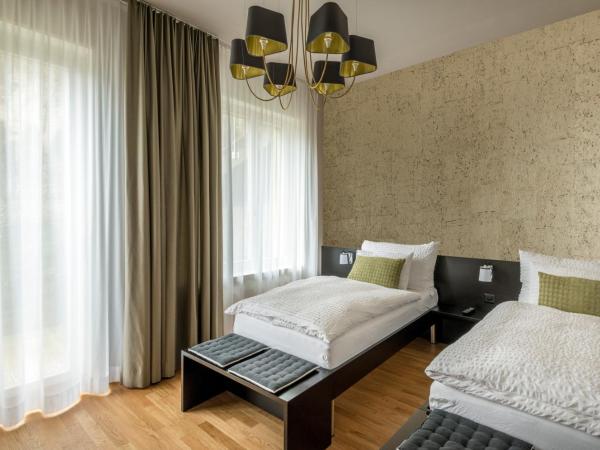 Boutique Hotel KARL : photo 5 de la chambre chambre quadruple supérieure avec balcon - vue sur rivière