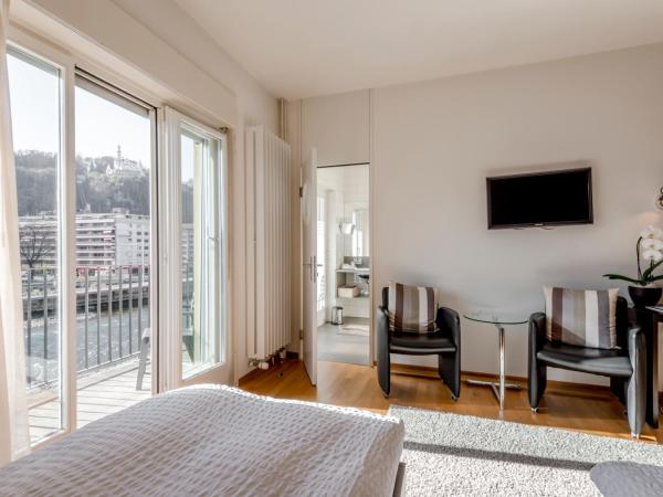 Boutique Hotel KARL : photo 10 de la chambre chambre triple avec balcon - vue sur rivière et montagne