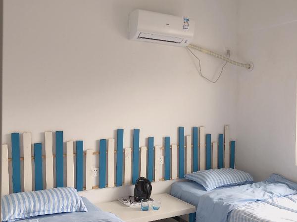 Suzhou Blue Gate Youth Hostel : photo 3 de la chambre chambre lits jumeaux avec salle de bains privative
