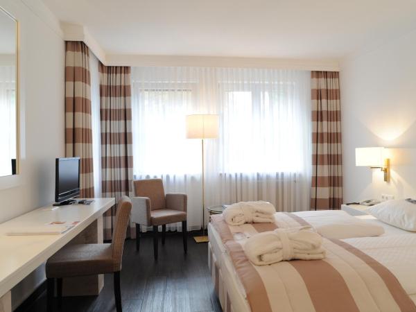relexa Waldhotel Schatten Stuttgart : photo 8 de la chambre chambre double supérieure