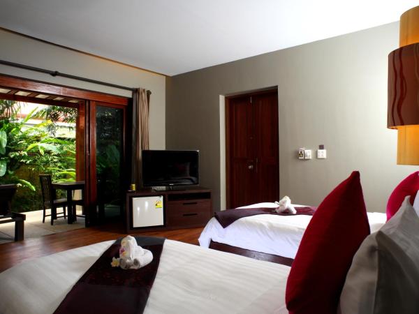 Chongfah Beach Resort Khaolak - SHA Extra Plus : photo 3 de la chambre bungalow 1 chambre avec vue sur le jardin