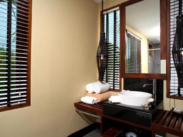 Chongfah Beach Resort Khaolak - SHA Extra Plus : photo 3 de la chambre chambre deluxe double ou lits jumeaux