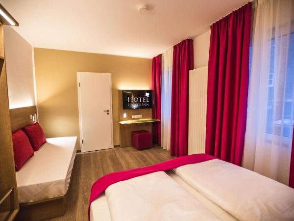 Hotel Luckys Inn : photo 4 de la chambre chambre triple avec salle de bains privative