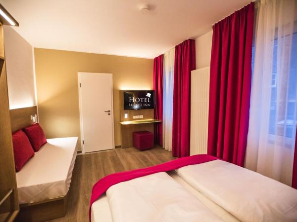 Hotel Luckys Inn : photo 4 de la chambre chambre triple avec salle de bains privative