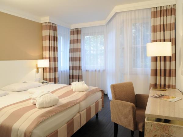 relexa Waldhotel Schatten Stuttgart : photo 7 de la chambre chambre double supérieure