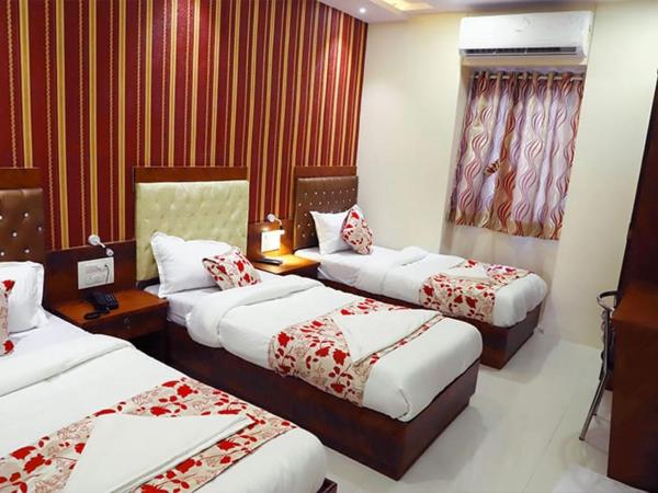 Hotel Golden Hayyath Inn : photo 4 de la chambre chambre quadruple supérieure