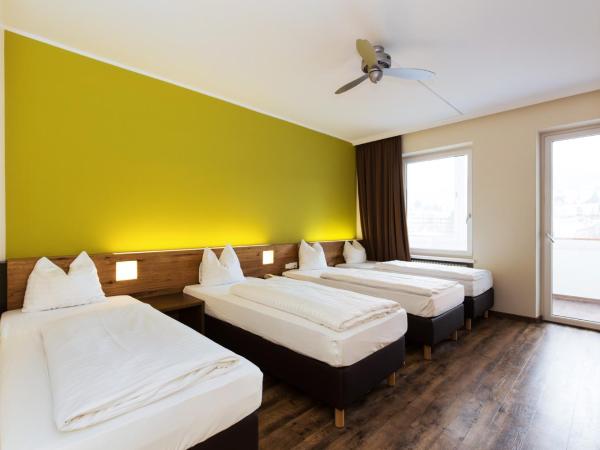 Basic Hotel Innsbruck : photo 1 de la chambre chambre quadruple