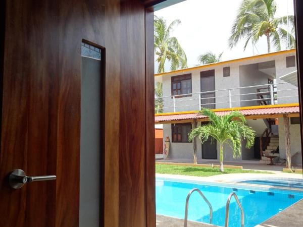 Coccoloba Guest House : photo 8 de la chambre suite - vue sur piscine 
