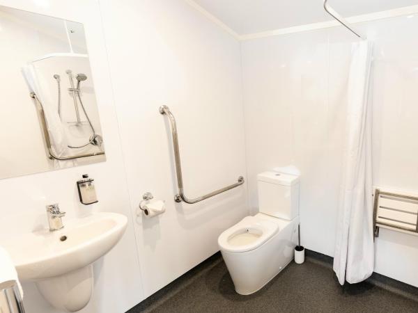 Queenstown Top 10 Holiday Park : photo 1 de la chambre studio lit queen-size 