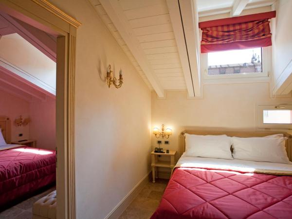 Hotel Cavour : photo 3 de la chambre chambre double ou lits jumeaux