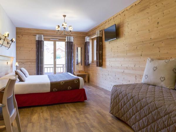 Chalet-Hôtel Le Beausoleil, The Originals Relais : photo 1 de la chambre chambre triple