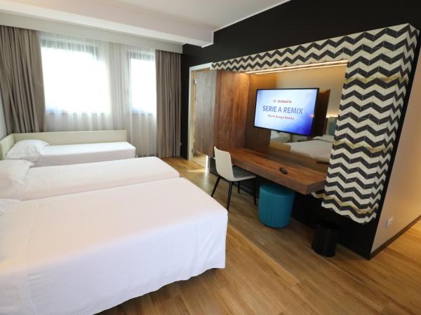 Hotel Domenichino : photo 5 de la chambre chambre triple supérieure
