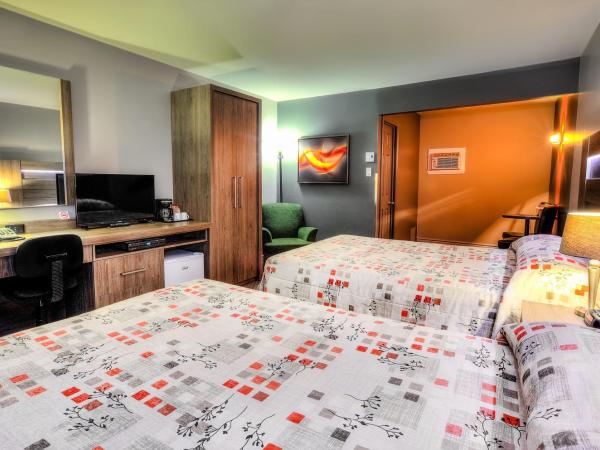 Hotel et Motel Le Chateauguay : photo 2 de la chambre chambre double standard avec 2 lits doubles