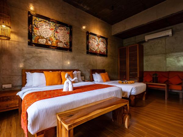 Ipoh Bali Hotel : photo 3 de la chambre deluxe triple room with garden view and bathtub